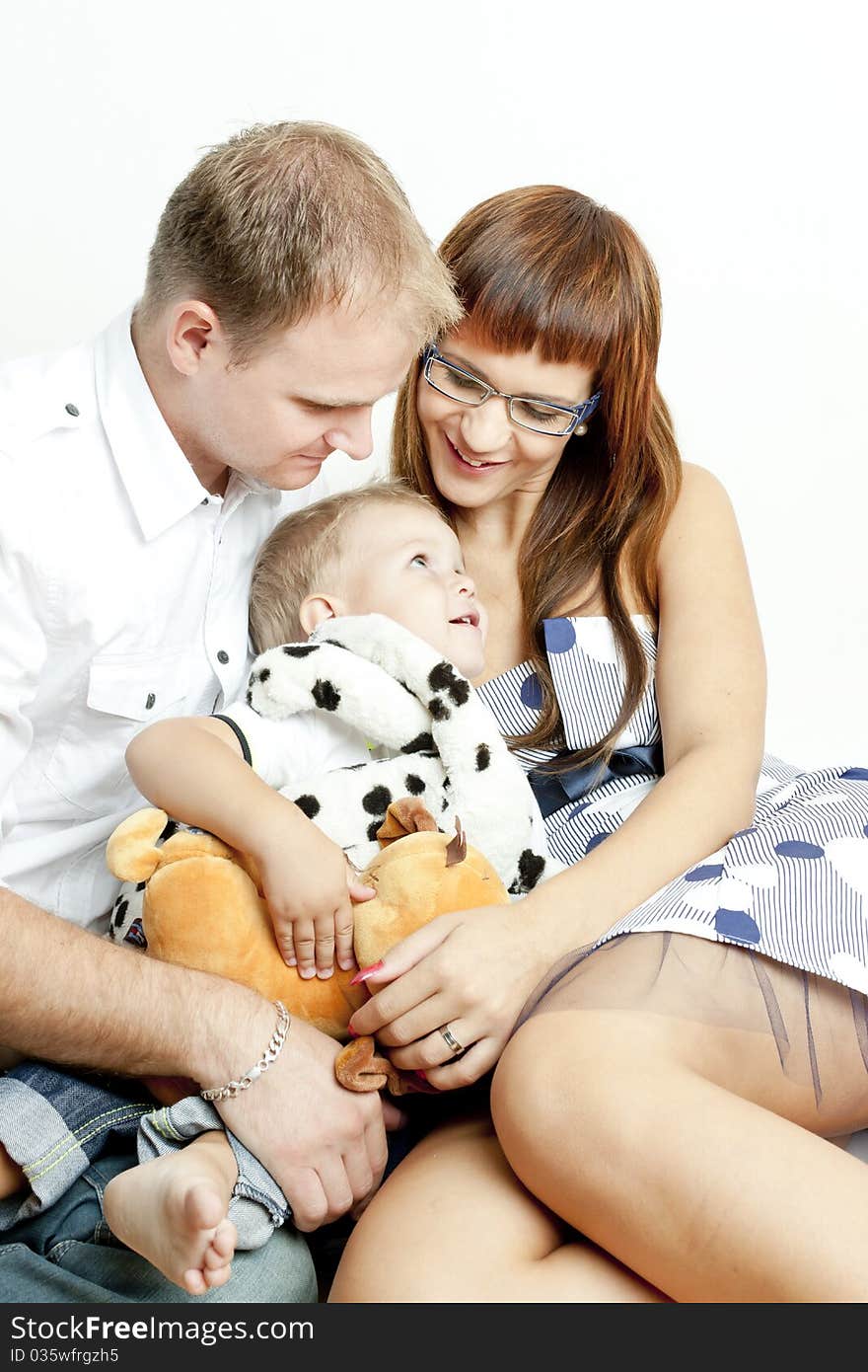 Portrait of parents with their little son. Portrait of parents with their little son