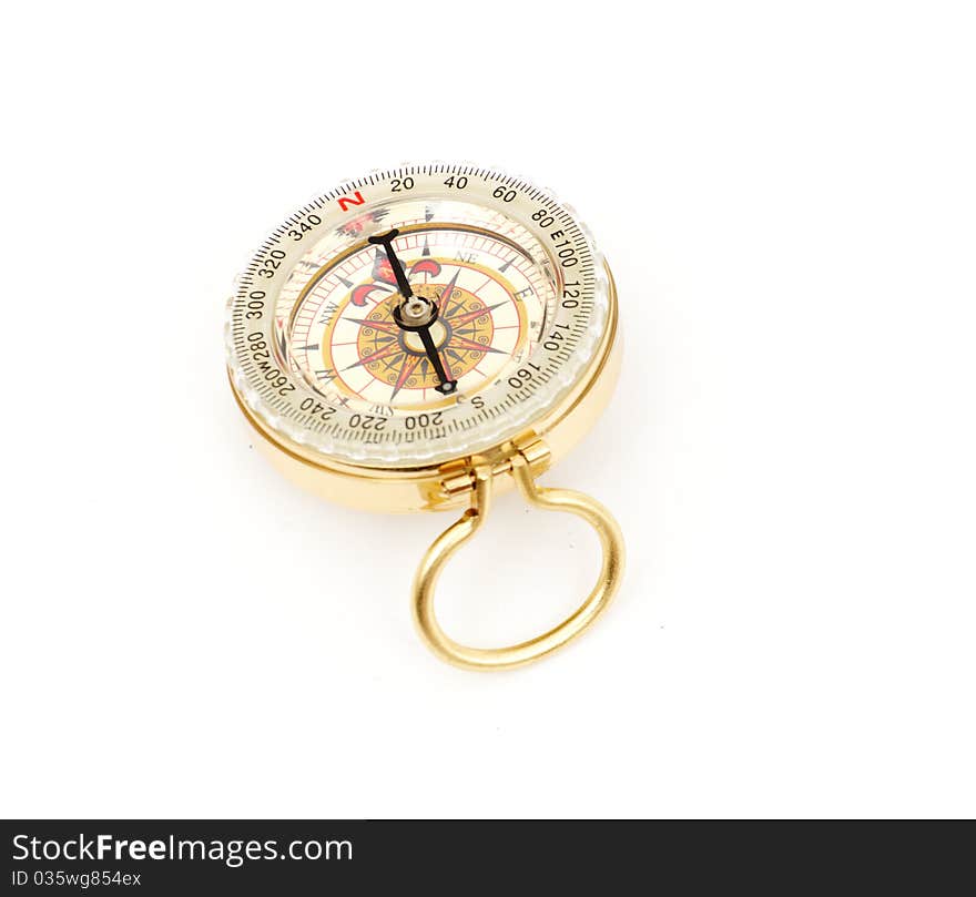 Old styled, gold compass on a white background.