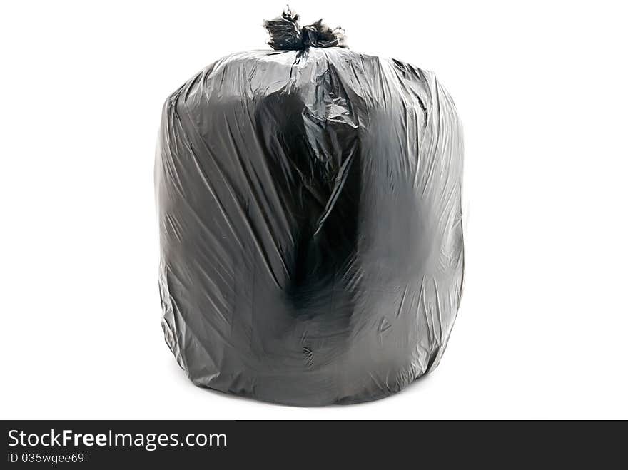 Tied garbage bag isolated on a white background. Tied garbage bag isolated on a white background.