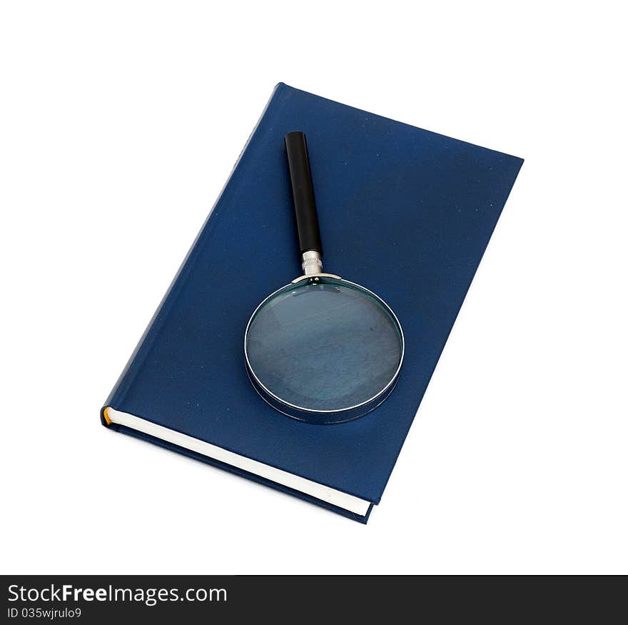 Magnifier and book isolated on a white background