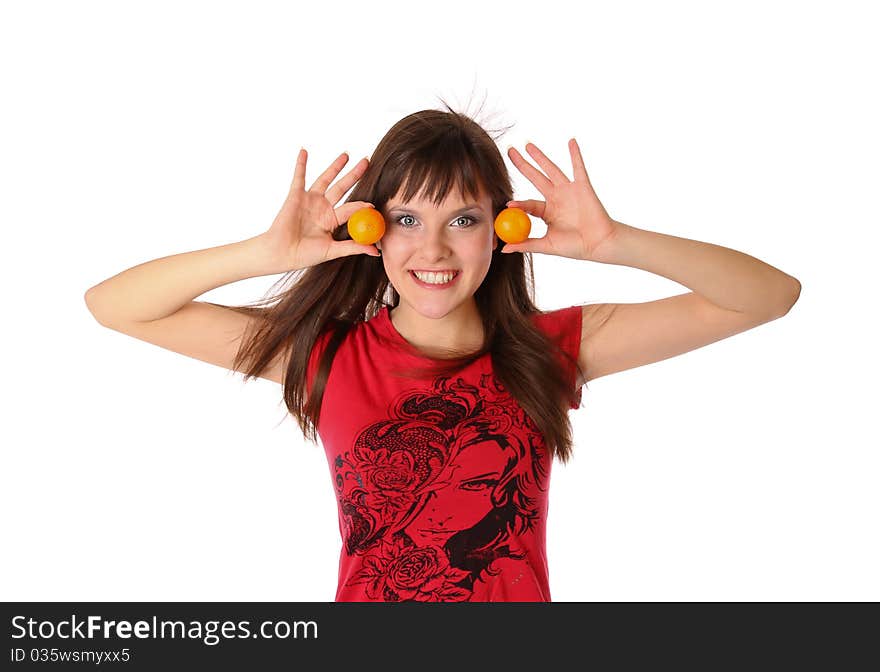 Smiling girl with tangerines. Isolated at white background