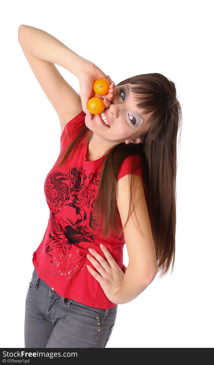 Smiling girl with tangerines