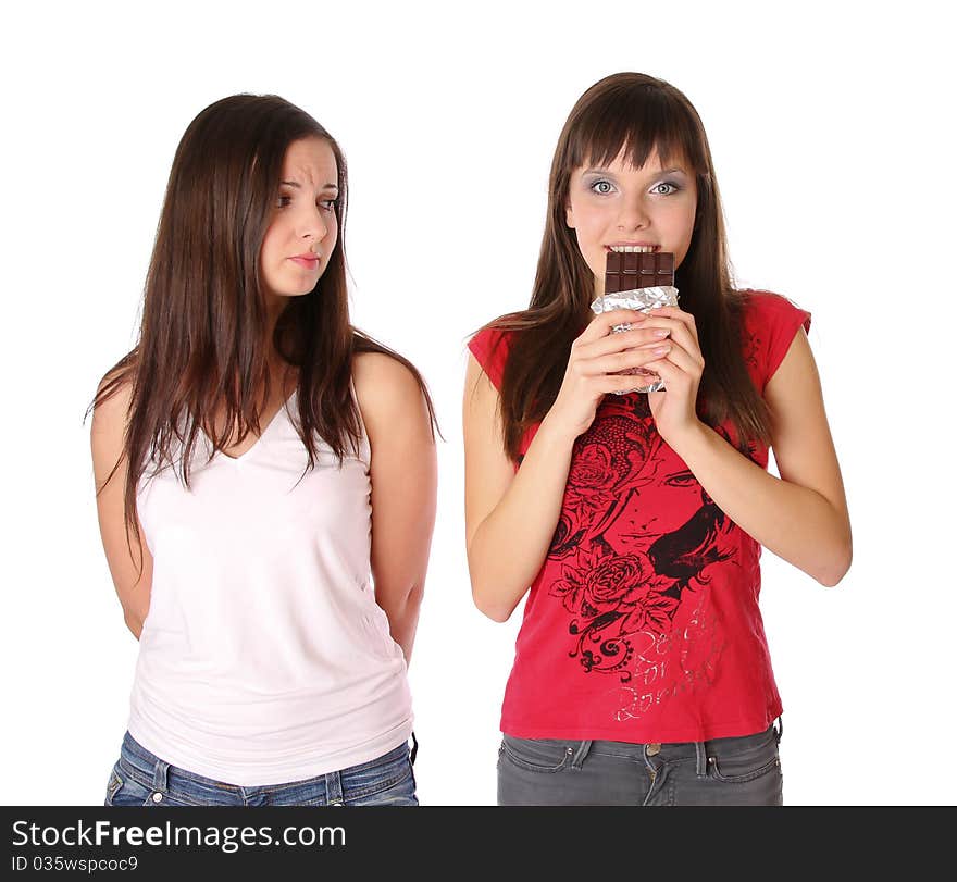 Two girls with chocolate. Isolated at white background