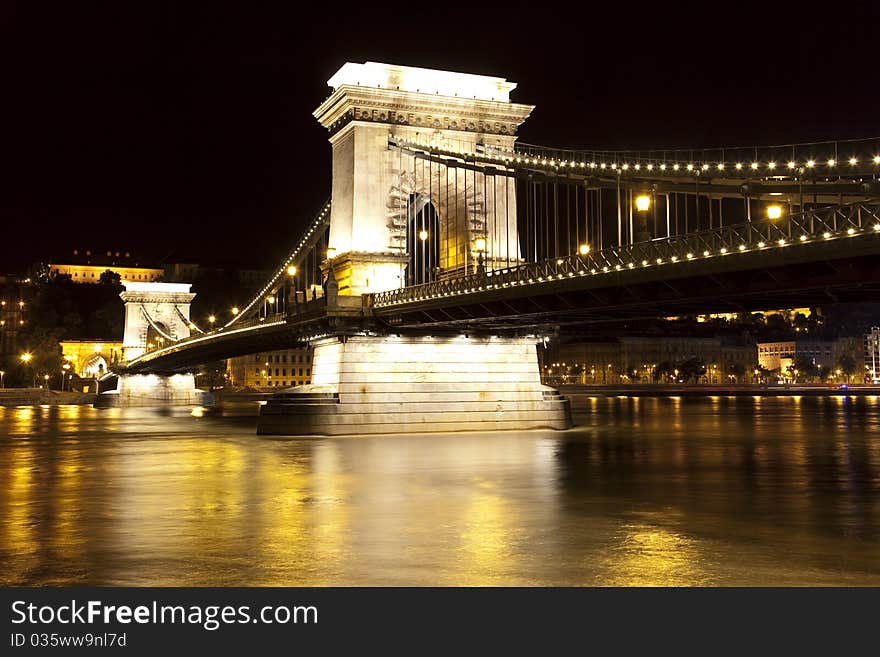 Hungarian landmarks, Chain Bridge and Royal Palace in Budapest by night. Long exposure.