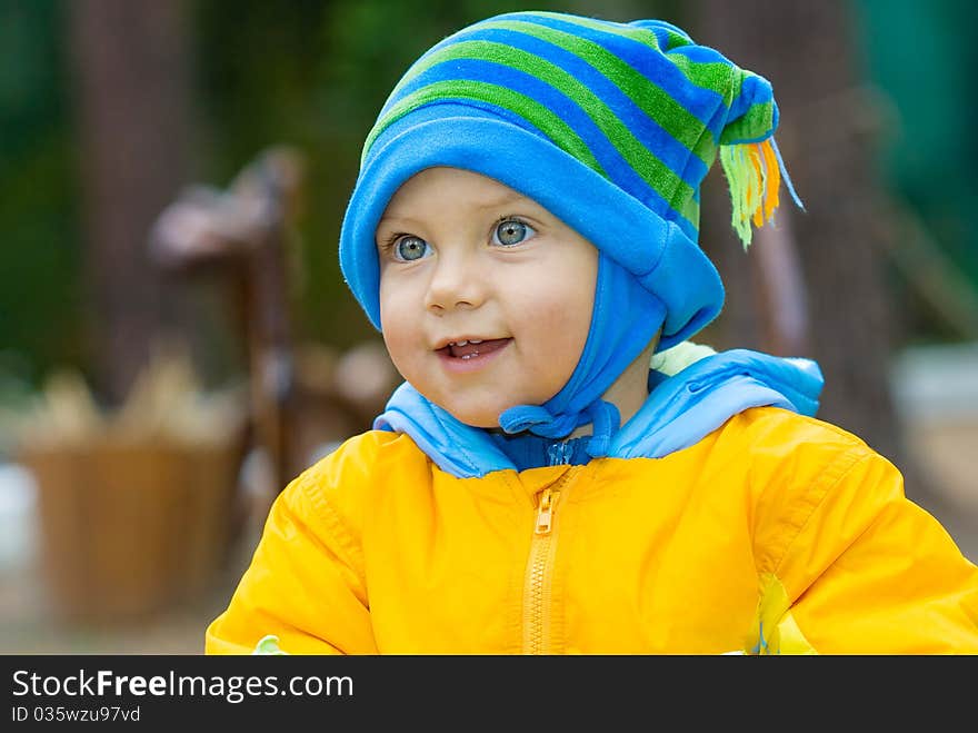 Sweet baby boy in park