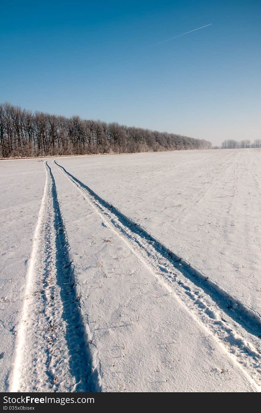 Trace of aircraft in the winter Sky