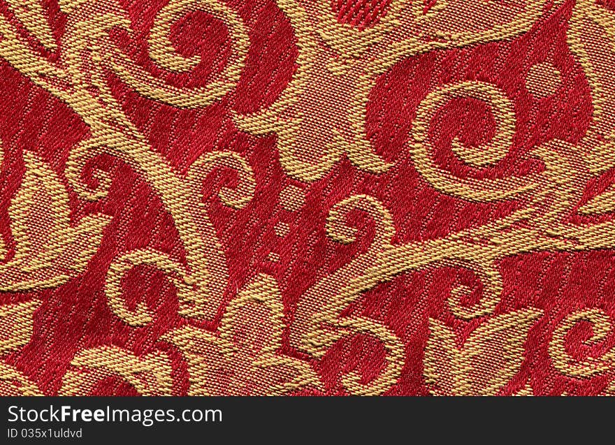 Red vintage fabric with gold decor