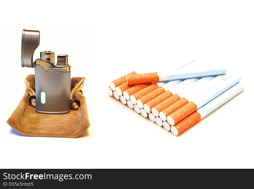 Photo of the cigarettes and lighter on white background