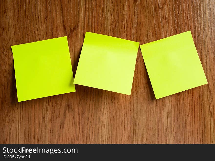 Three pieces of paper glued to the memo board. Three pieces of paper glued to the memo board