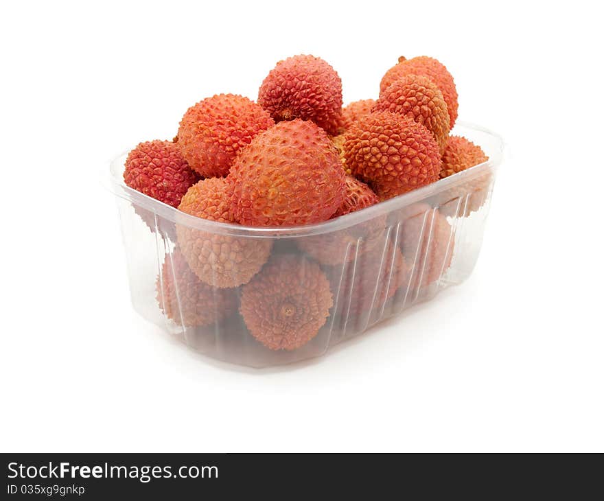 Litchi in the plastic box, isolated on white background.