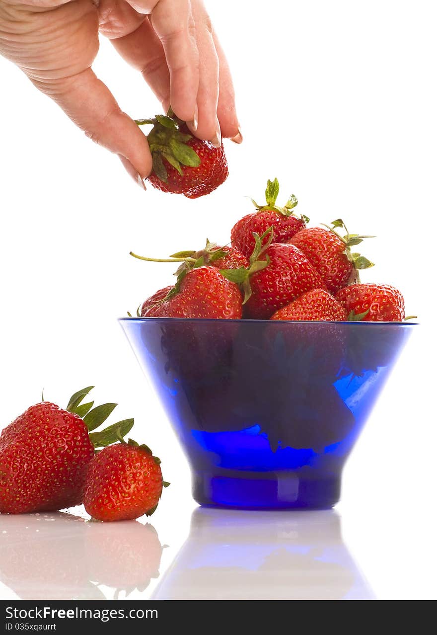 Natural  large strawberry with girl hand