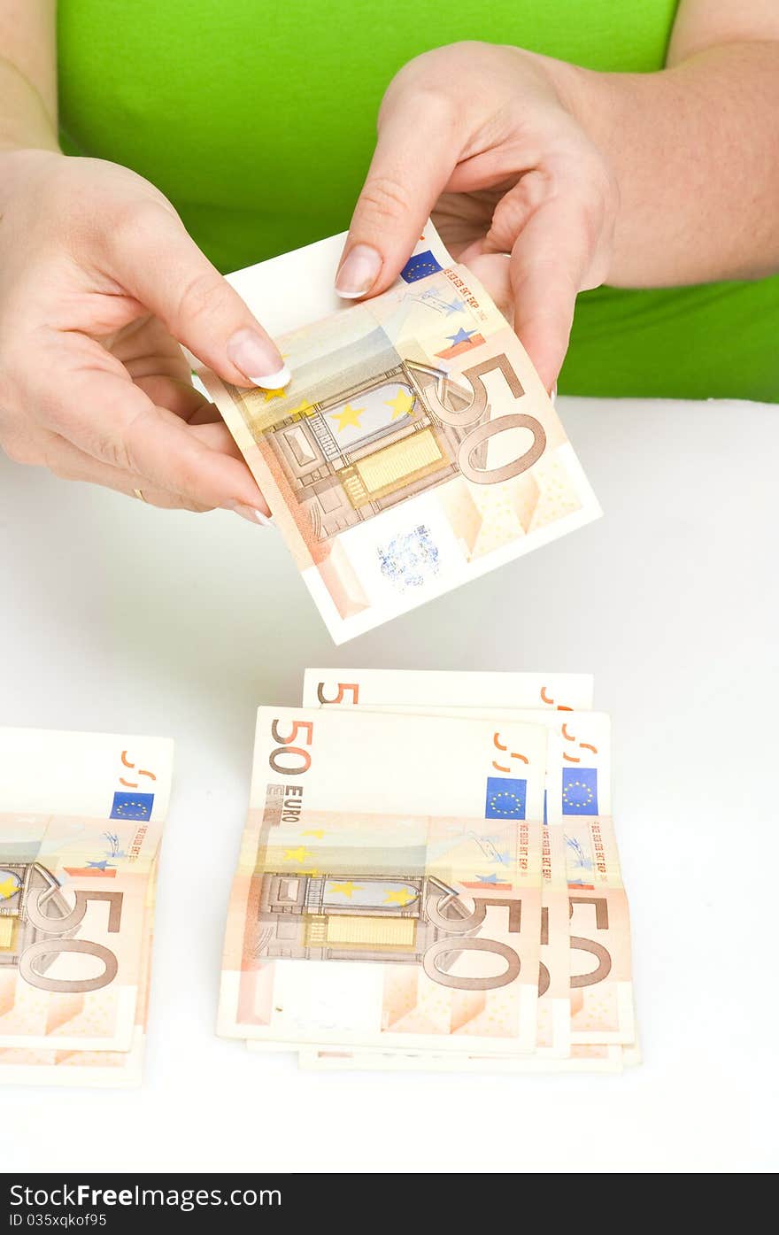 50 euro currency in women hand. 50 euro currency in women hand