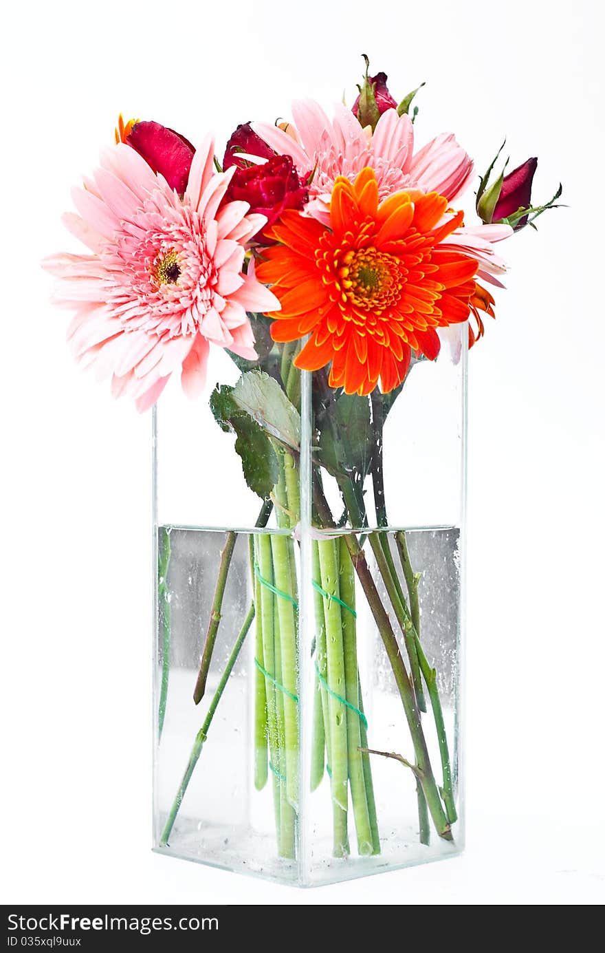 Vase of the many colorful flowers combined together. Vase of the many colorful flowers combined together.