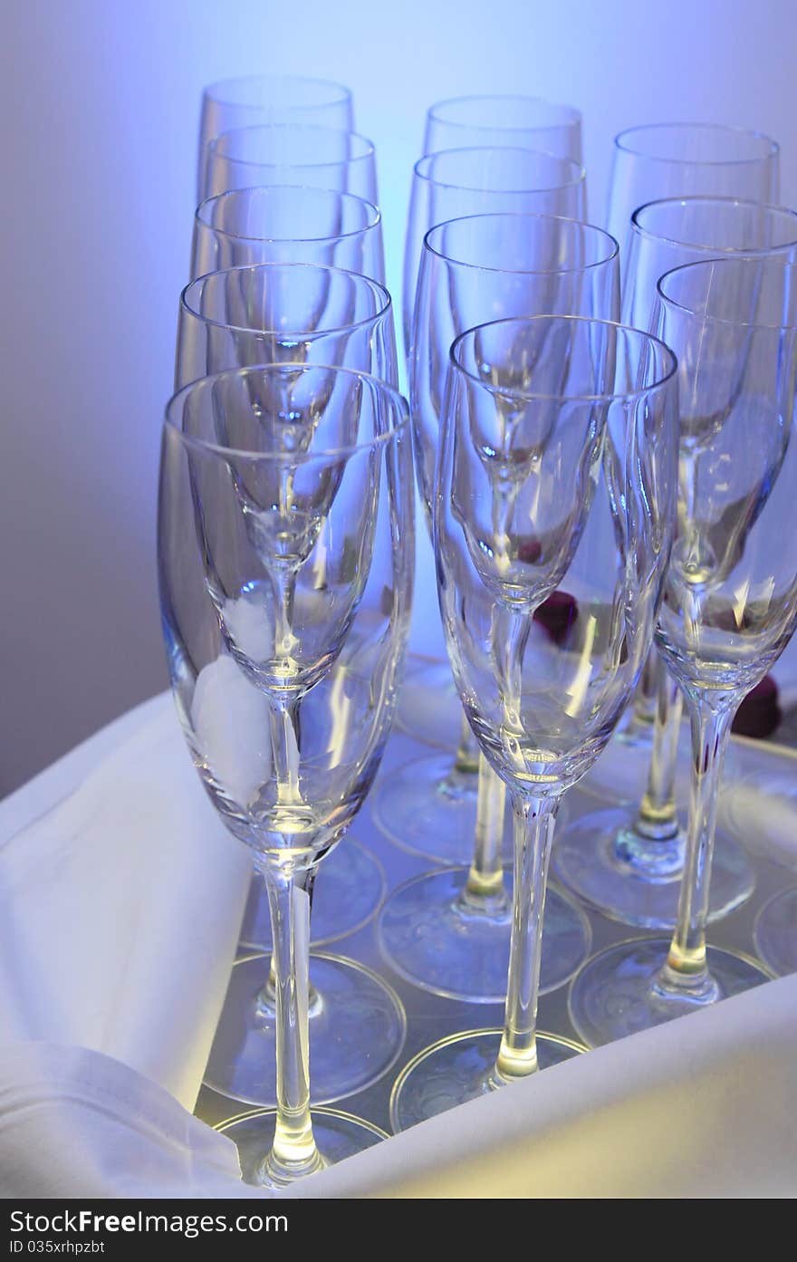 Empty wine glasses on a tray at restaurant. Empty wine glasses on a tray at restaurant.