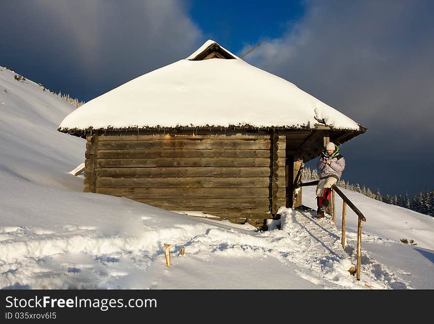 Hiker boy in winter in mountains