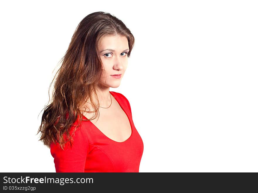 Close-up of a beautiful young woman in red dress on white background. Close-up of a beautiful young woman in red dress on white background