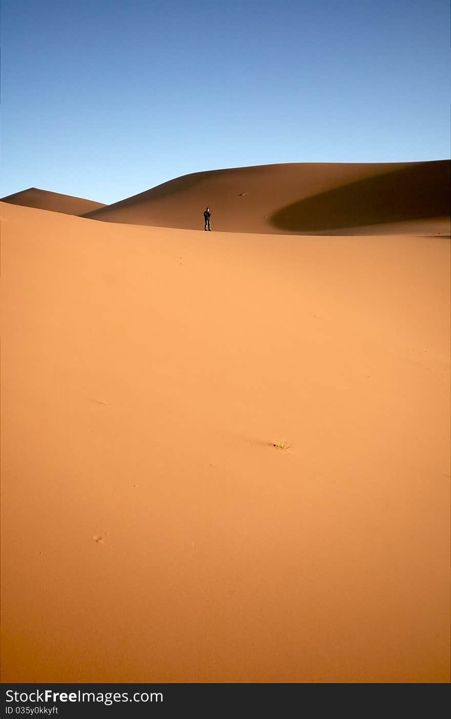 People at the dunes of the Moroccan Sahara. People at the dunes of the Moroccan Sahara