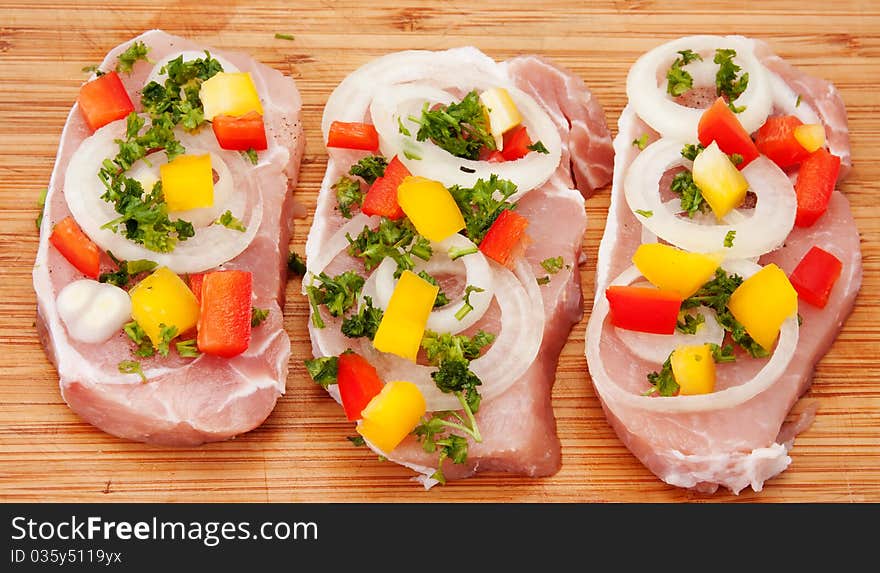 With vegetables on a cutting board. With vegetables on a cutting board