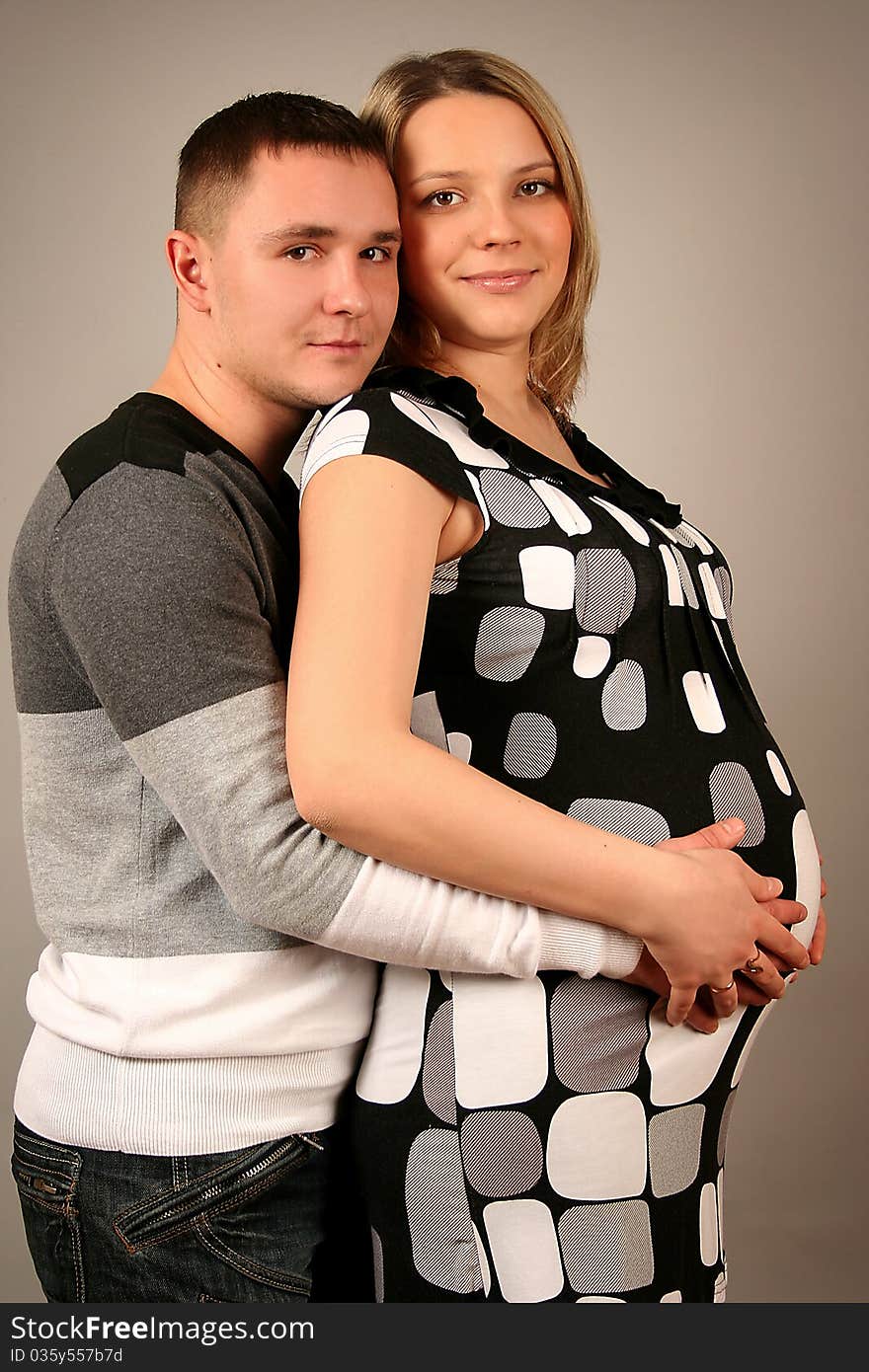 Beautiful young couple waiting baby