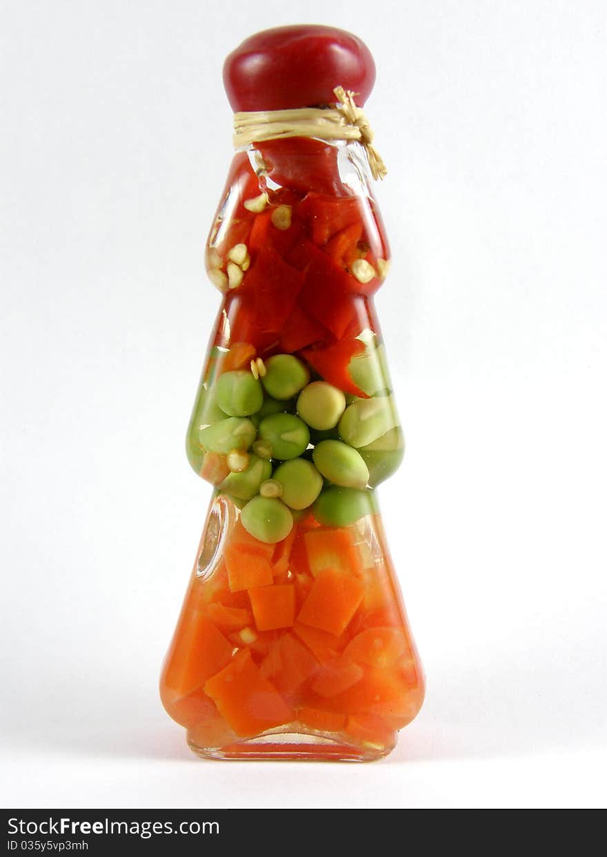 Vegetables preservation. Bottled home made food stuff.