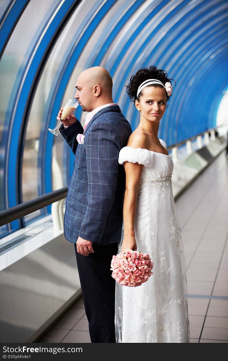 Bride and groom  on wedding walk in interiors