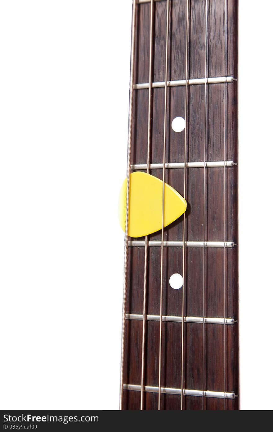Guitarneck and pick from infront