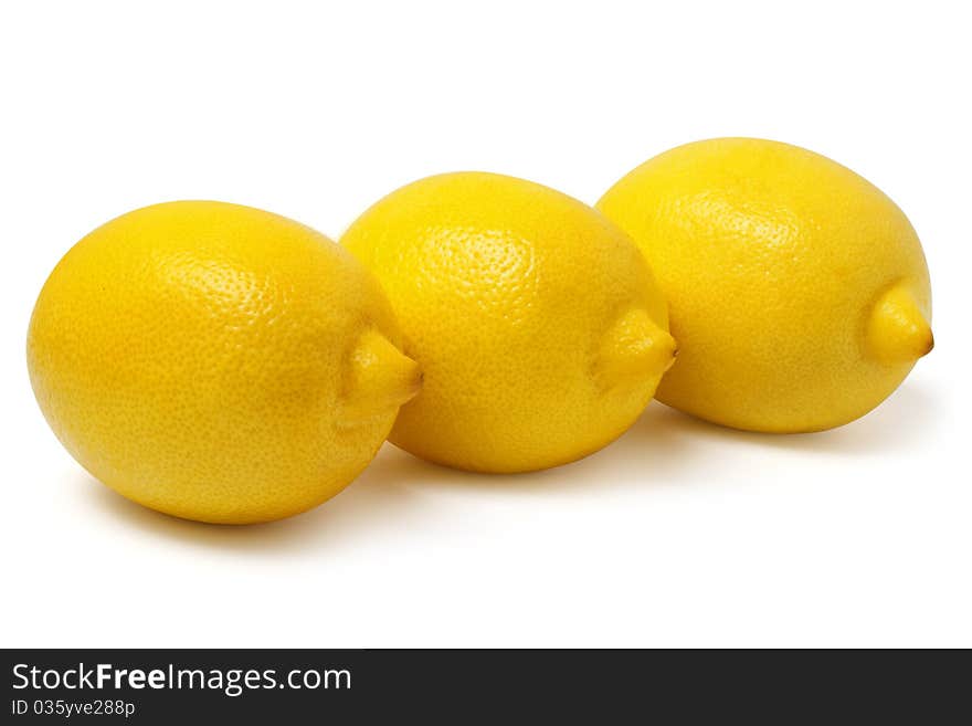 Three lemons on a white background + Clipping Path