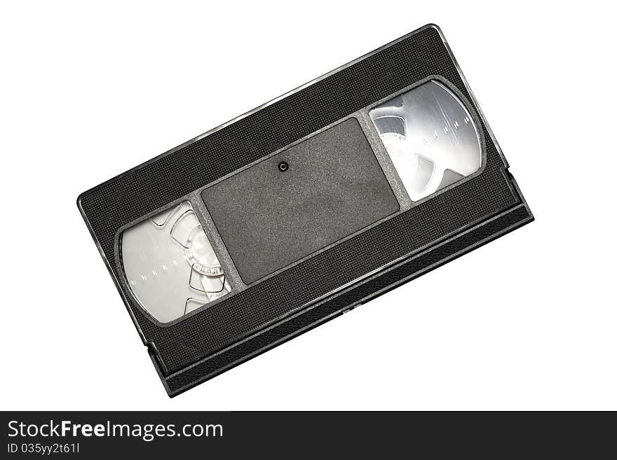 An old video cassette in black on a white background