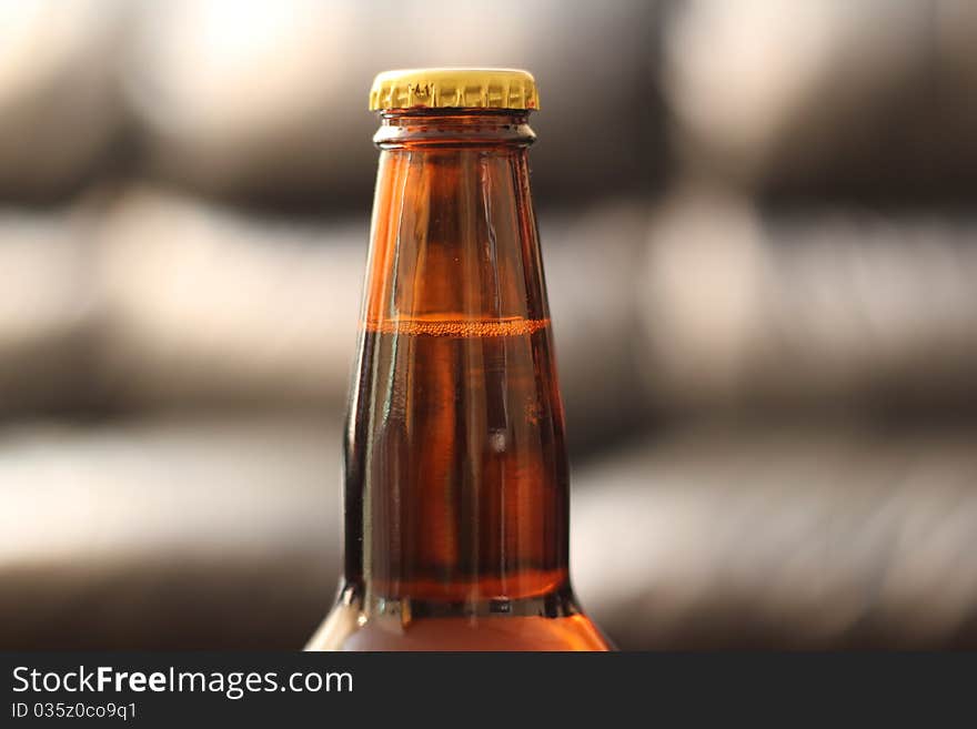 Close up of a beer bottles neck. Close up of a beer bottles neck