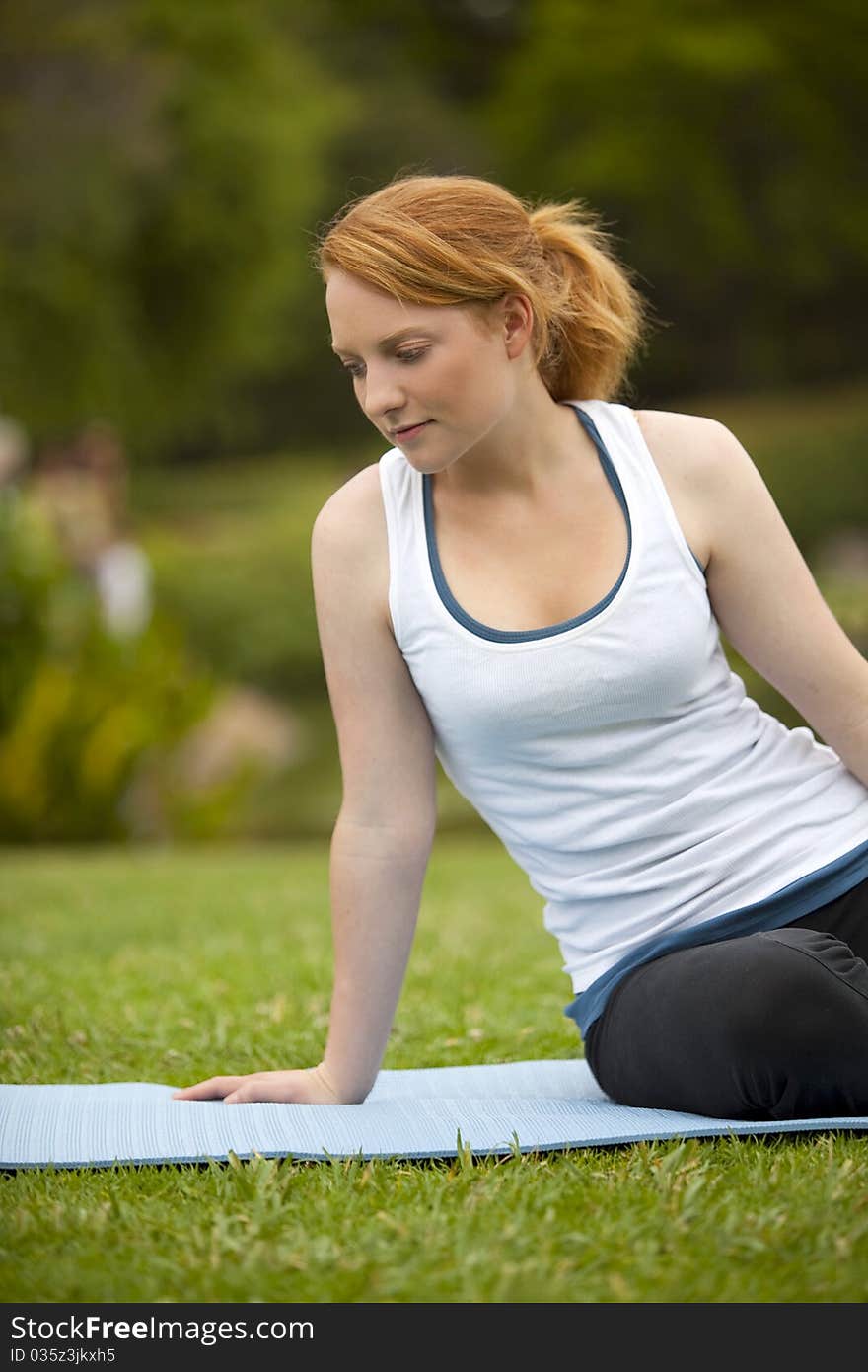 Young woman meditating yoga pose