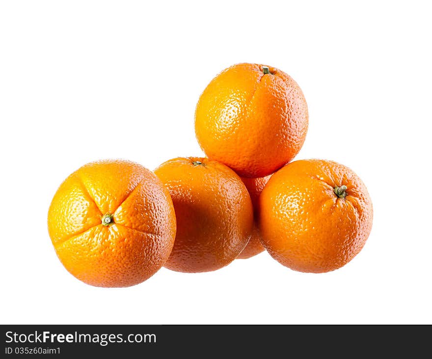 Four perfectly fresh oranges isolated on white. Four perfectly fresh oranges isolated on white.