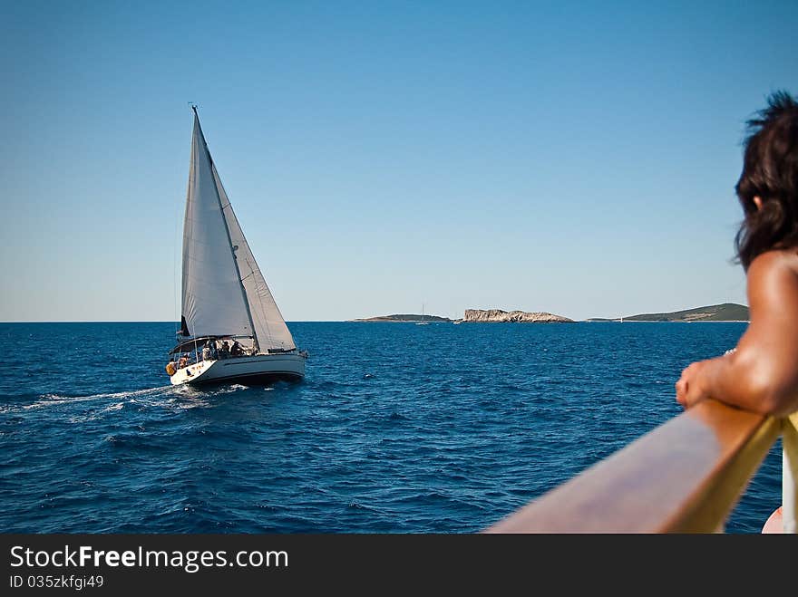 A sailboat in the beautiful waters of Croatia. A sailboat in the beautiful waters of Croatia