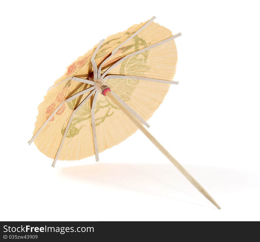 Umbrella for cocktails on a white background