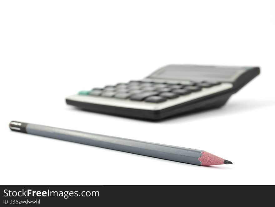 Simple pencil and a calculator on a white background