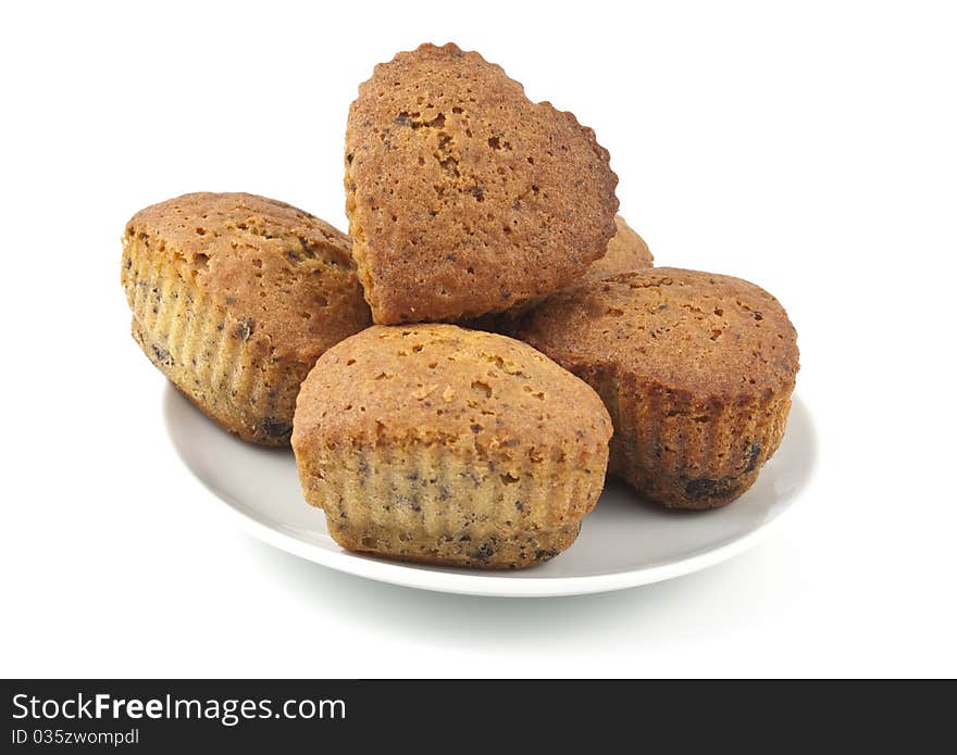 Muffins with chocolate in a heart on a white background