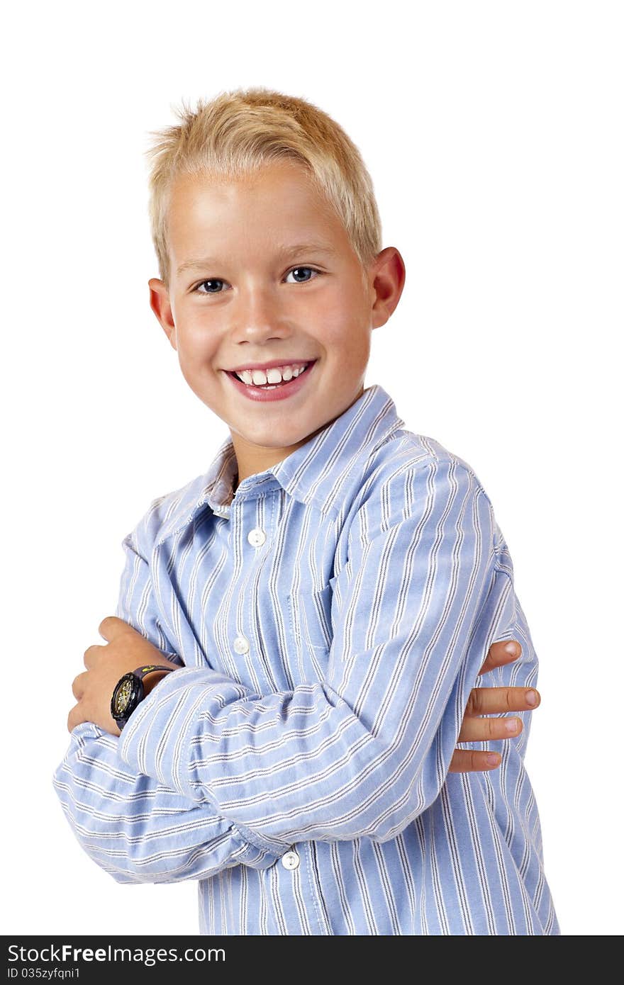 Portrait Of Young Smiling Boy With Crossed Arms