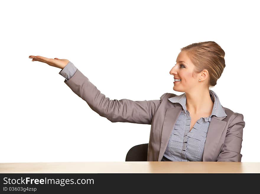 Businesswoman in suit pointing hand