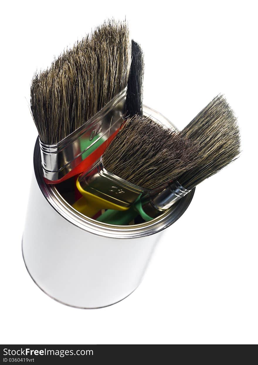 Paint can with brushes