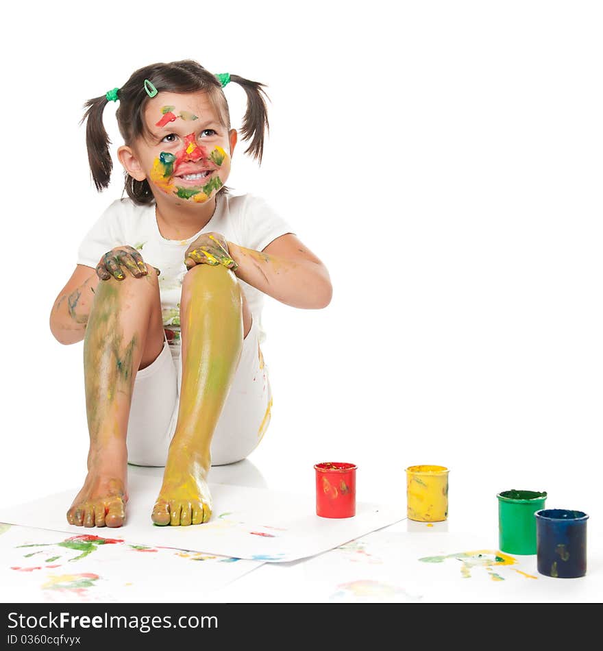 Happy smiling little girl playing and painting with colors isolated on white background. Happy smiling little girl playing and painting with colors isolated on white background