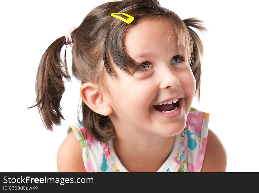 Happy smiling little girl having fun isolated on white background. Happy smiling little girl having fun isolated on white background