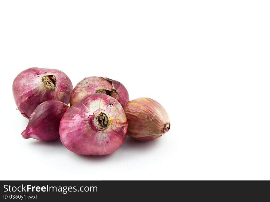 Group of red shallot isolated on white background