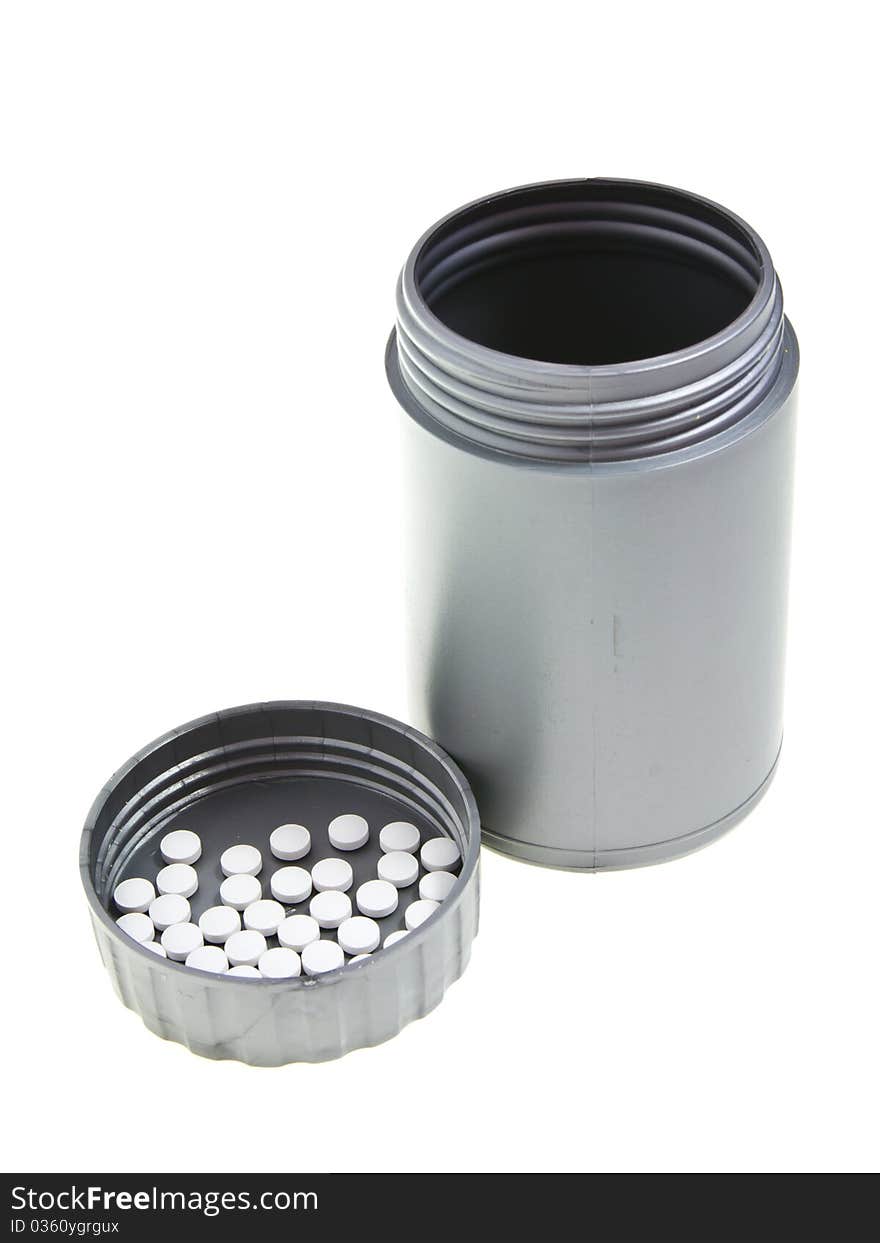 Plastic gray medecine bottle with peels on lid. Plastic gray medecine bottle with peels on lid