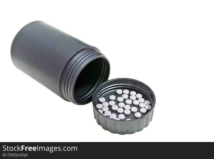 Plastic gray medecine bottle with peels on lid. Plastic gray medecine bottle with peels on lid