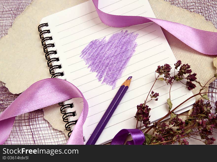 Valentine background with writing-pad, old texturized paper, herbs and shiny ribbons. Horizontal composition. Valentine background with writing-pad, old texturized paper, herbs and shiny ribbons. Horizontal composition