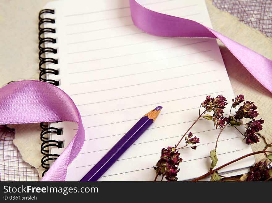 Pretty background with shiny ribbons and herbs for romantic notes. horizontal composition. Pretty background with shiny ribbons and herbs for romantic notes. horizontal composition