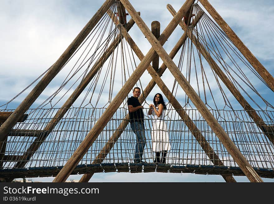 Couple on a wood bridge