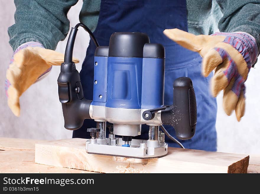 Milling cutter manual electric on a tree close up