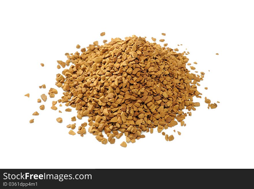 A pile of granulated instant coffee isolated on a white background