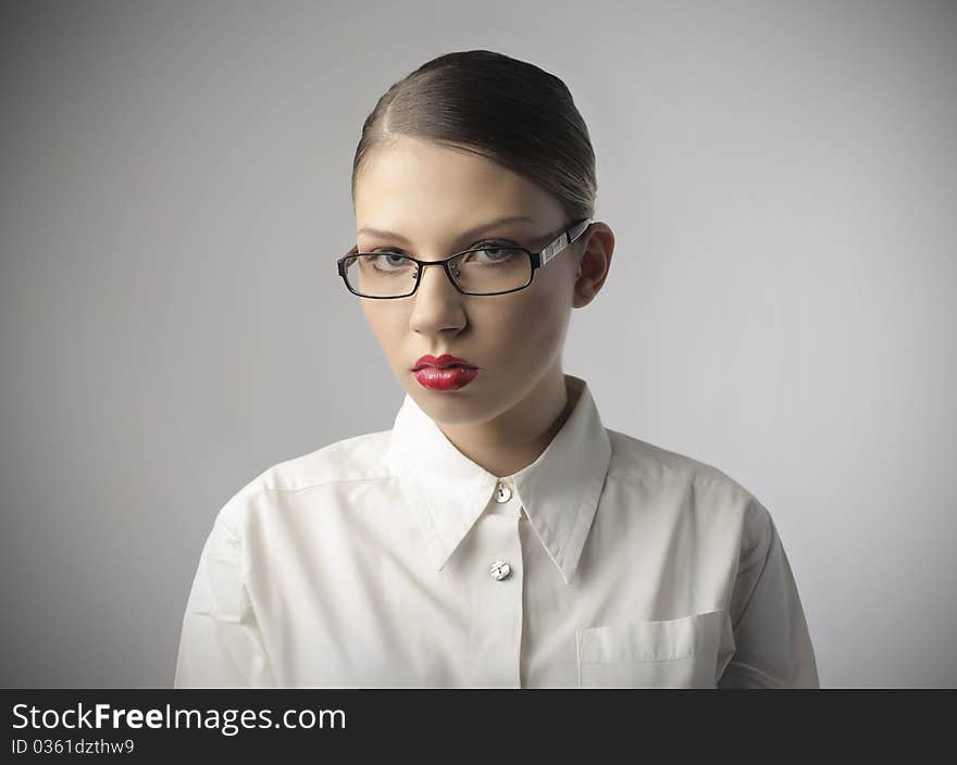 Portrait of a beautiful serious businesswoman. Portrait of a beautiful serious businesswoman