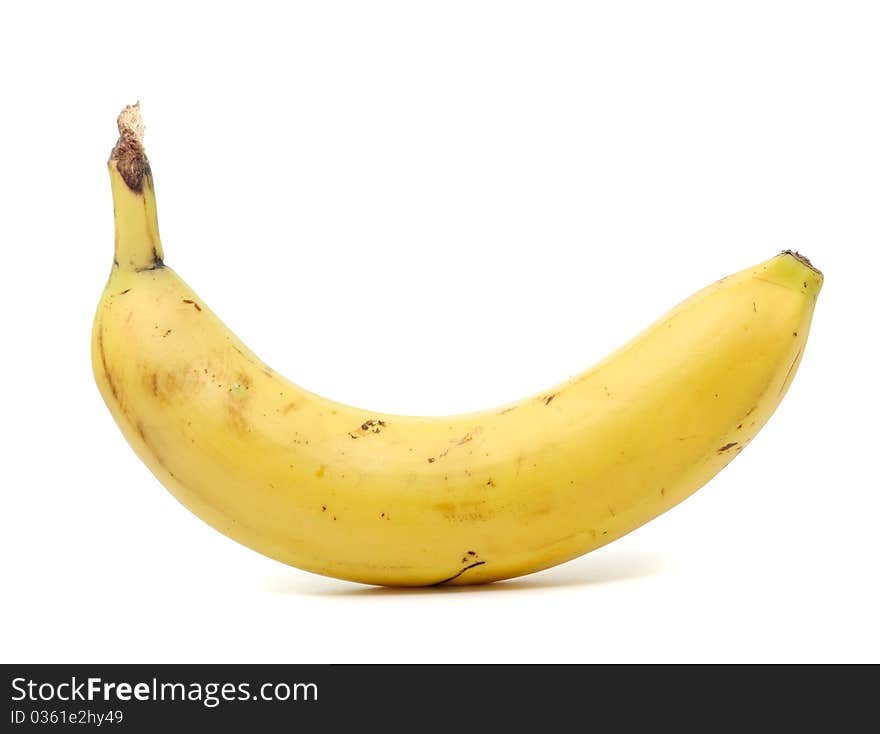 A ripe banana isolated on a white background